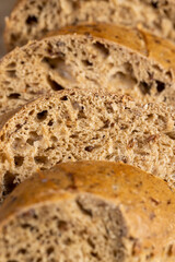 a healthy loaf of soft bread with added seeds and bran