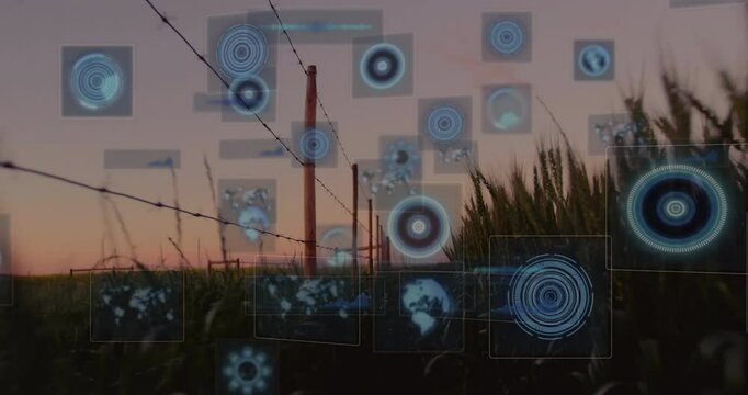 Digital data processing animation over agricultural field with barbed wire fence