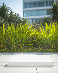 Modern garden with minimalist stone slab surrounded by lush greenery and contemporary building