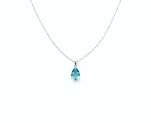 Fototapeta premium Minimalist silver necklace with small aquamarine drop and clean lines Generative AI