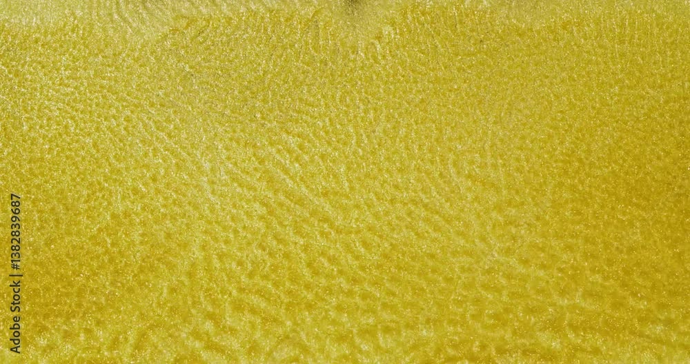 Poster yellow alcohol ink drops flowing and merging, creating intricate cells and dynamic chemical reaction