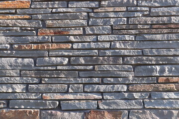 Naklejka premium Stone Slate Walls Brickwork Slim Strip Rectangular Bricks uniform neat texture surface background