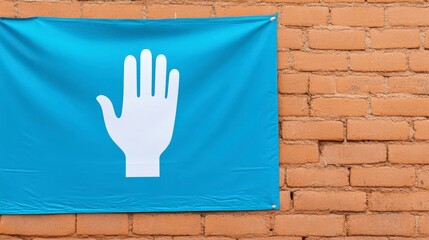 Large Banner Displaying Global Handwashing Message on Brick Wall