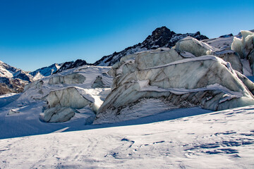Obraz premium Fee glacier photographed on a glacier tour with snowshoes in winter. The glacier is located above Saas Fee in Valais. Simply breathtakingly beautiful Switzerland.