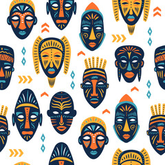 Seamless pattern of ritual masks of African ethnic tribes of various shapes