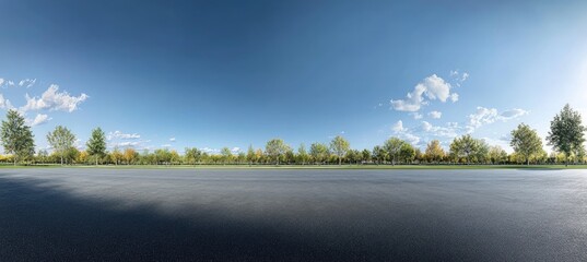 Empty asphalt road with trees and sky