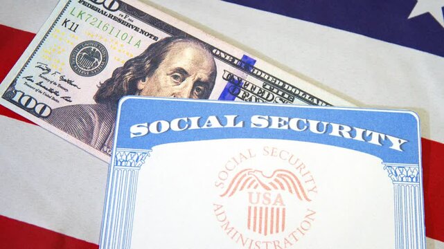 Zooming onto Social Security Card with U.S. Dollar currency bill and flag in the backdrop, 4k Footage. SSN, benefits, people, usa