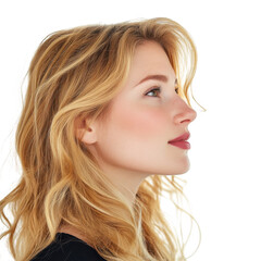 Naklejka premium Profile view of a woman with blonde wavy hair looking upwards in a black top against a black background