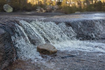Water flowing over rock