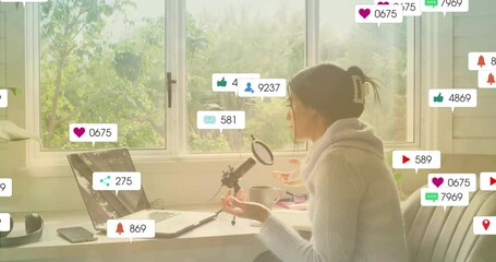 Recording podcast at home, person engaging with animation of social media notifications - Powered by Adobe