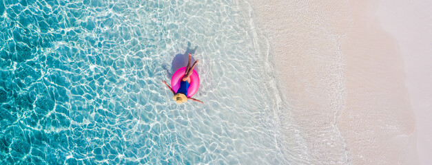 Top above high angle aerial drone view of her she attractive girl rich chic lady floating on rubber...