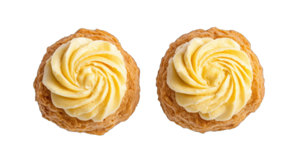 two beautifully crafted pastries topped with swirls of creamy fr