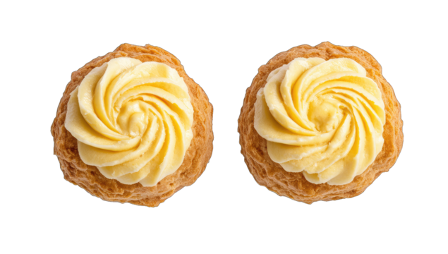two beautifully crafted pastries topped with swirls of creamy fr