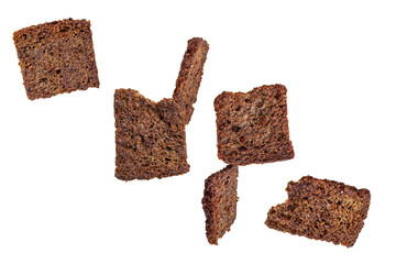 Brown rye croutons, toasts.. Isolated on transparent background.