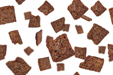 Brown rye croutons, toasts. Seamless background. Isolated on transparent background.