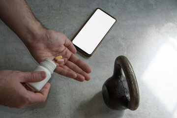 Man uses a mobile phone with white screen