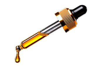 Dropper with golden liquid and drop falling