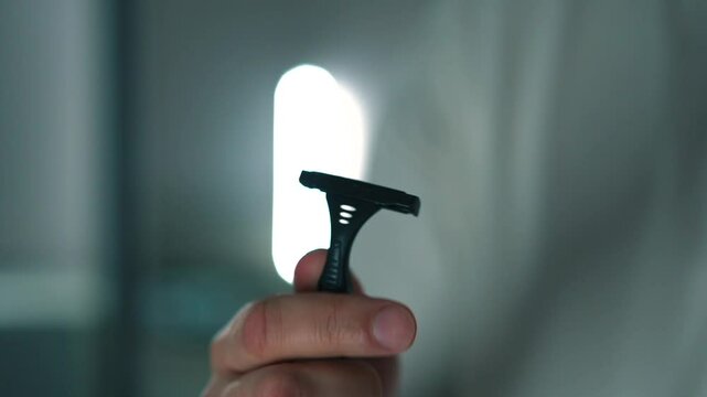 Sharp razor close-up.
Man about to shave.
Skin irritation after shaving.
Blade on a razor