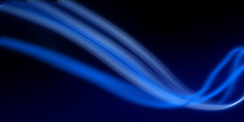 Dark abstract background with blue neon glowing lines. Abstract background, neon light, laser show,...
