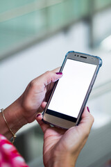 Human Hand using smartphone mobile phone with social media concept.