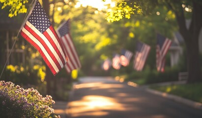 Row of american flags waving on suburban street at sunset celebrating independence day