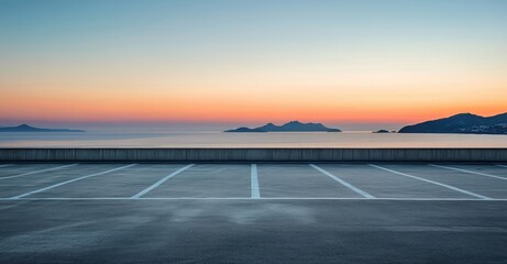 Fototapeta premium Empty parking lot at sunset overlooking the sea