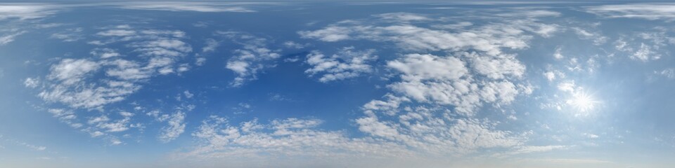 Obraz premium blue sky hdri 360 panorama with clouds before sunset with zenith for use in 3d graphics as sky dome or edit drone shot as sky replacement