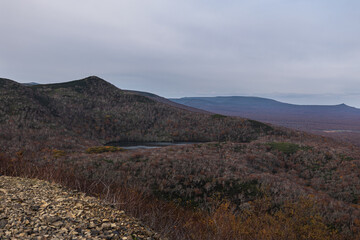 Mountain lake on the island of Iturup, Kuril Islands. Natural resources
