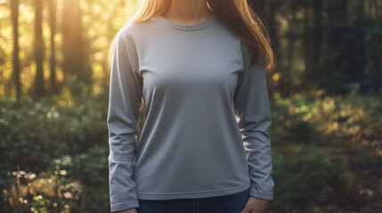 mockup of a woman wearing a plain gray long sleeve t-shirt isolated on forest background, Ai generated images