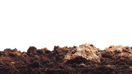 A close up view of brown dirt and soil against a black background in a studio setting outdoors