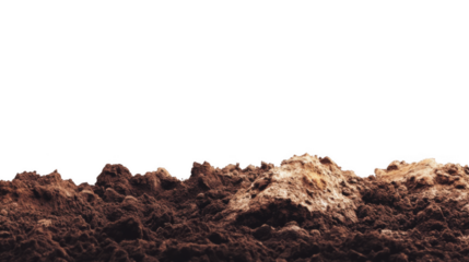 A close up view of brown dirt and soil against a black background in a studio setting outdoors