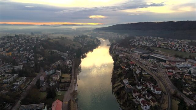 Scenic top view of Schaffhausen, charming Swiss town on Rhine River. Historic old town, Munot Fortress and picturesque waterfront blend beautifully with skyline on sunny morning. Luftansicht von Rhein