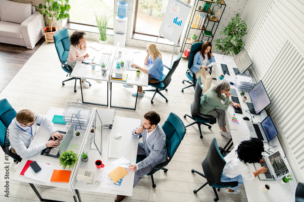 Poster modern shared workspace with diverse professionals collaborating on projects in a corporate office e