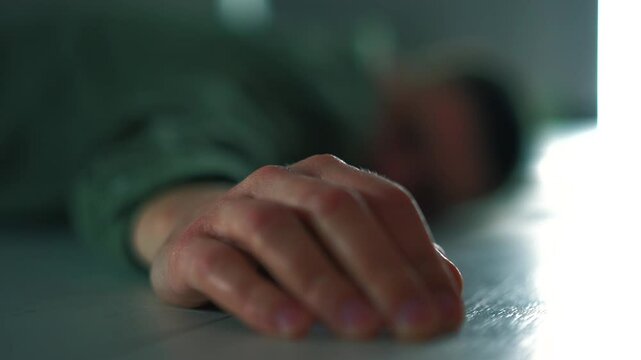 Man dead and lying on the floor.
Heart attack in a man.
Man fell on the floor due to illness and heart attack