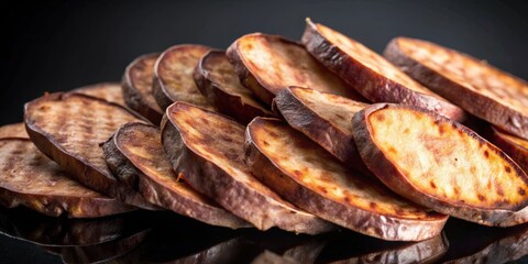 Crisp Baked Sweet Potato Slices Arranged in a Stack with Browned Edges and a Glossy Finish