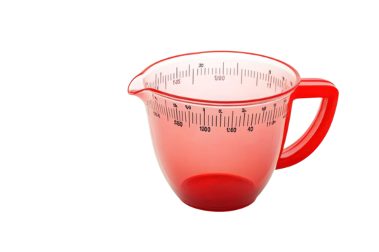 A bright red measuring cup sits elegantly on a white surface, showcasing precise measurements