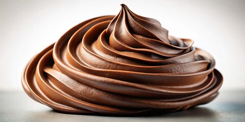 Close-up of a swirl of rich and decadent chocolate frosting, showcasing its smooth texture and tempting appeal