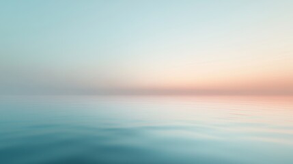 Calm ocean horizon during pastel sunrise

