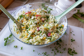 Chinese cabbage salad with peppers, onions, green peas in a delicious dressing. Tasty homemade barbecue salad
