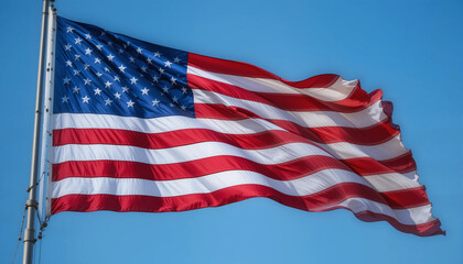 American Flag: A vibrant American flag billows proudly in the wind against a bright sky. Evoking a sense of freedom, patriotism, and national identity.
