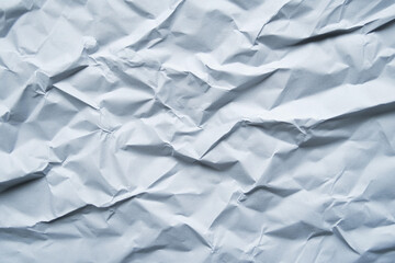 Crumpled paper texture providing a handmade, artistic background for creative projects and crafts