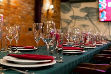 set table with cutlery and glasses