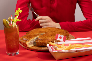 Canada Day traditional food concept. A girl in a classy cafe eats in Canada. Breakfast and lunch.