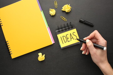 Creative thinking ideas and innovation concepts. Yellow coloured light bulb on the background