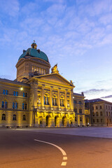 Naklejka premium Bern, Switzerland - December 26. 2020: The Swiss parliament building Bundeshaus in twilight, Bern, Switzerland