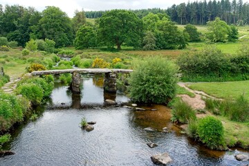 Postbridge Clapper Bridge in Dartmoor National Park in Devon England