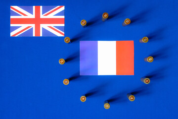 ​Bullet casings mimic the circle of stars on the EU flag. United Kingdom, and French flag....