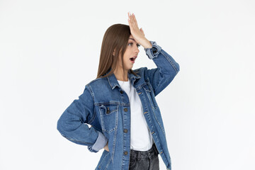 Gosh why me. Portrait of unhappy displeased and annoyed young arrogant woman facepalming with...