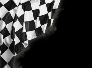 Racing flag with black and white checkers with smoke in darkness, space for text