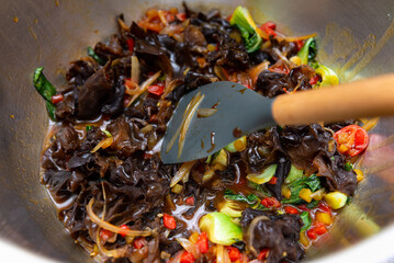 Stir-fried wood ear mushrooms with vegetables.